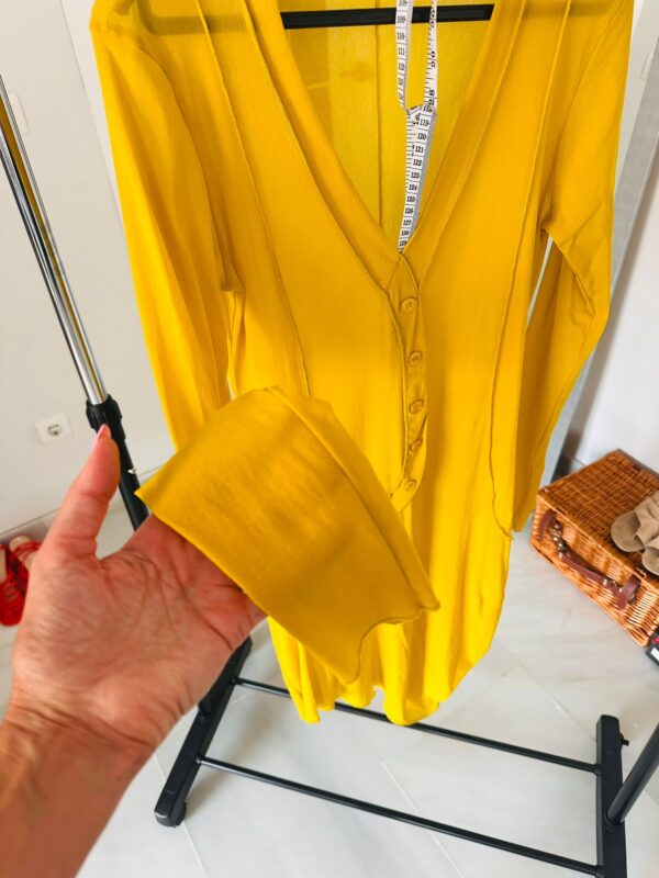 Cora Kemperman yellow dress